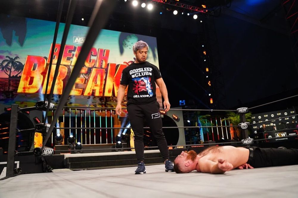 KENTA standing over a knocked out Mox at AEW Beach Break 2021
