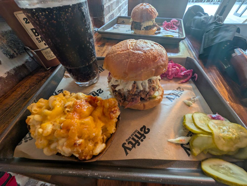 Pulled pork sandwich, mac and cheese, pickles and onions, diet coke from 2fifty Texas bbq in DC 