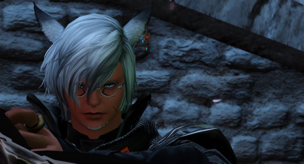 This user's old man miqo'te wol glaring at the camera, stone bg