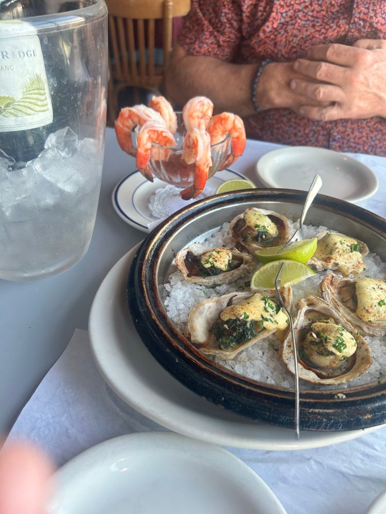 oysters rockefeller and a shrimp cocktail 
