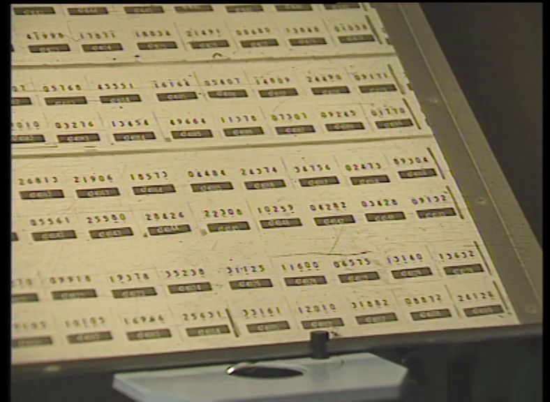 A photograph of a series of five digit numbers.