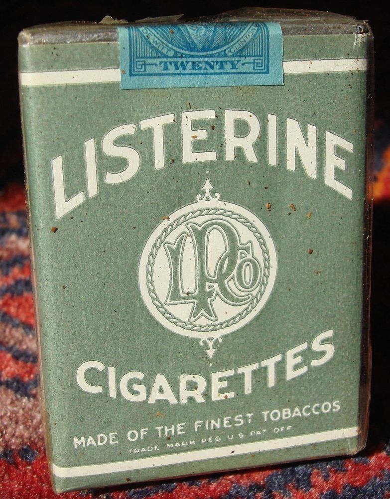 A green tin advertising Listerine Cigarettes