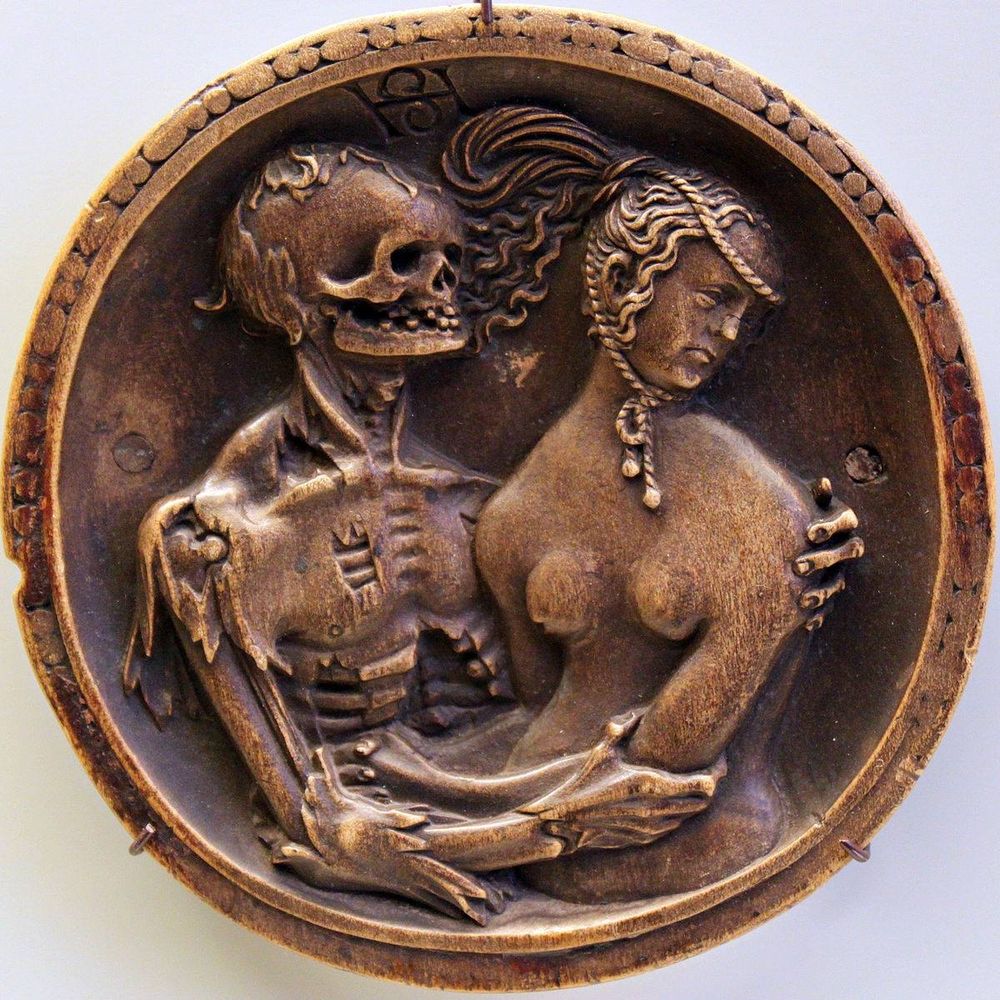 A bas relief depicting a skeleton representing Death holding a woman who looks strangely like Donald Trump 
