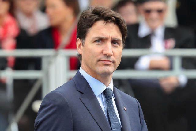 Canadian Prime Minister Justin Trudeau looking dreamy with a steely look of determination on his face.