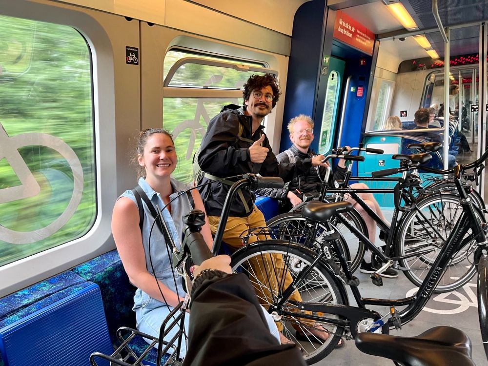 people on train with bikes