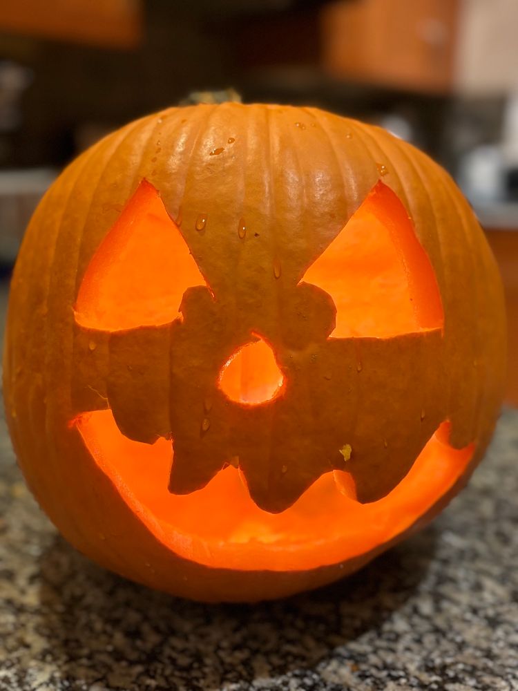 A candle-lit jack-o-lantern