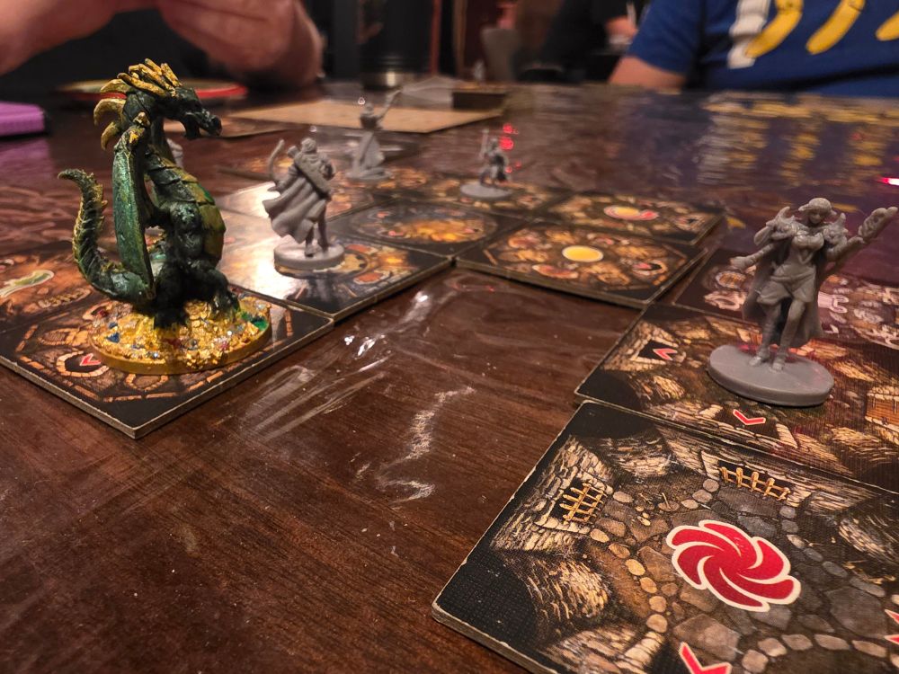 A dungeon tile game with a dragon