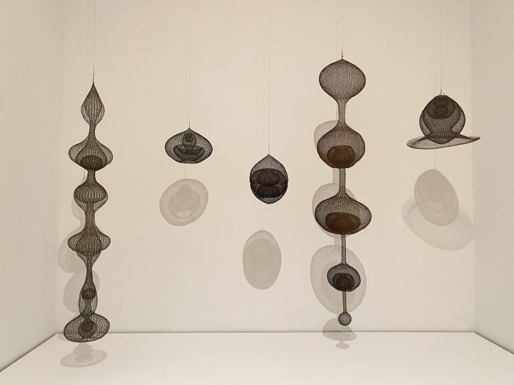 four hanging Ruth Asawa sculptures 