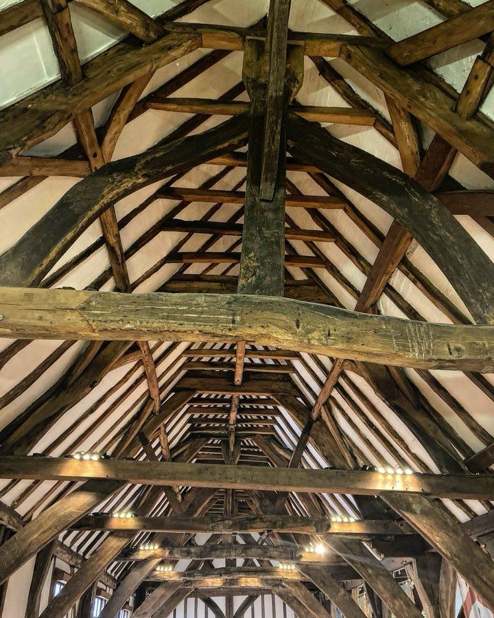 We are looking at a close up of a timber framed roof.