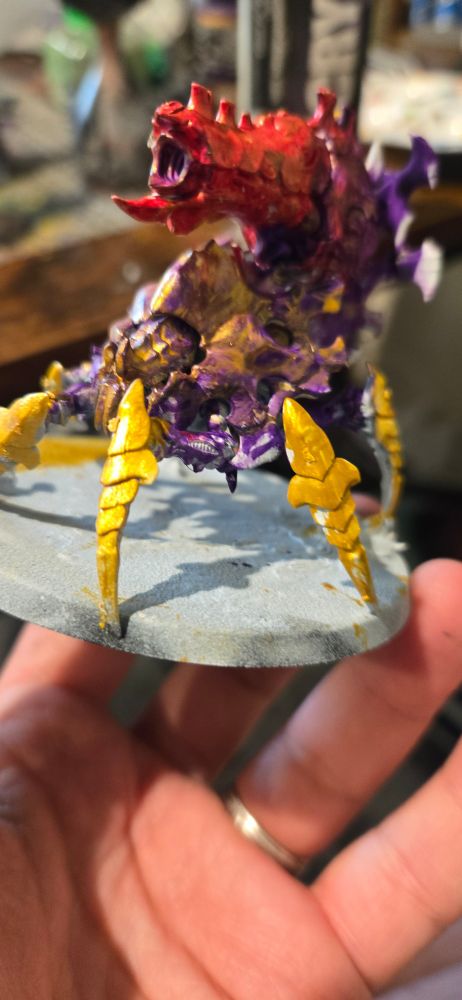 Rainbow shiny bug on a white base. I believe it's a pyrovore 
