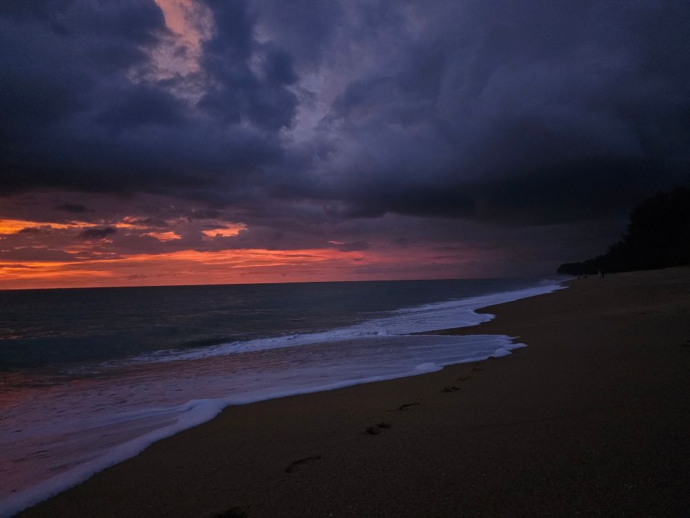 Photo of Mai Khao beach at sunset.