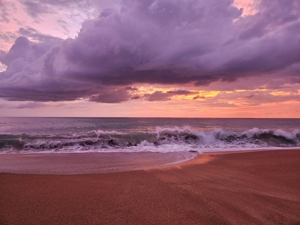 Photo of Mai Khao beach at sunset.