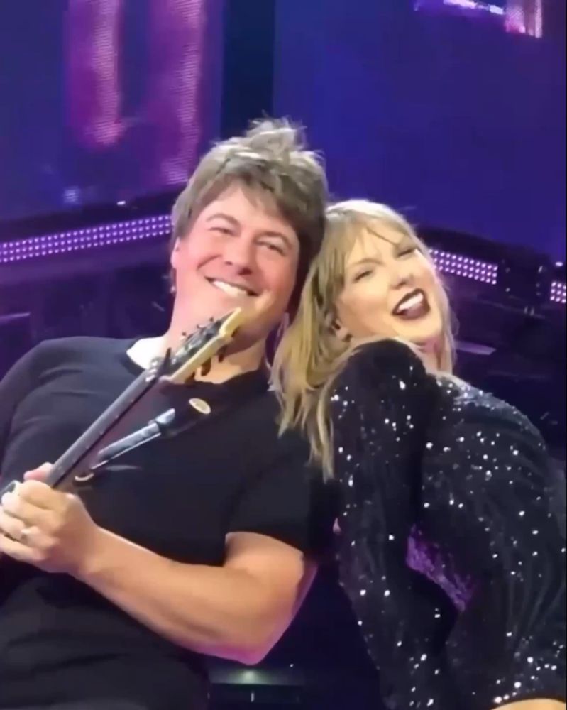 taylor swift & paul (idk how to spell his last name) during the rep tour. taylor has straight hair