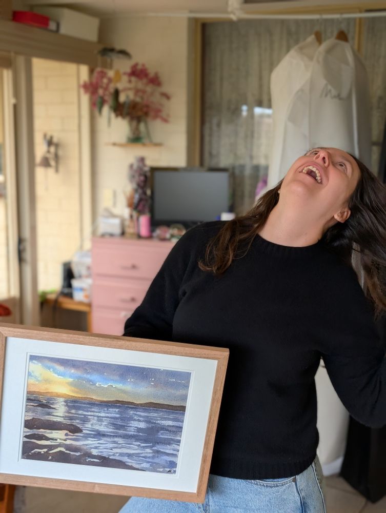 Just a normal photo of me with the painting I entered into a local art exhibition 