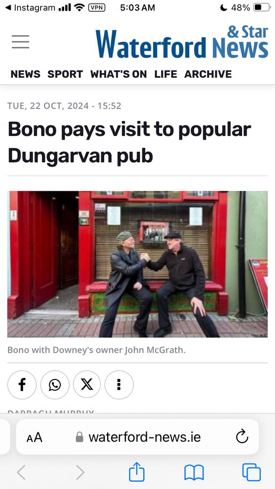A screenshot of the Waterford Star and News article from Oct. 23, 2024, titled “Bono pays visit to popular Dungarvin pub.” Below it is a photo of Bono and the pub owner clasping hands in front of the afore mentioned pub. 