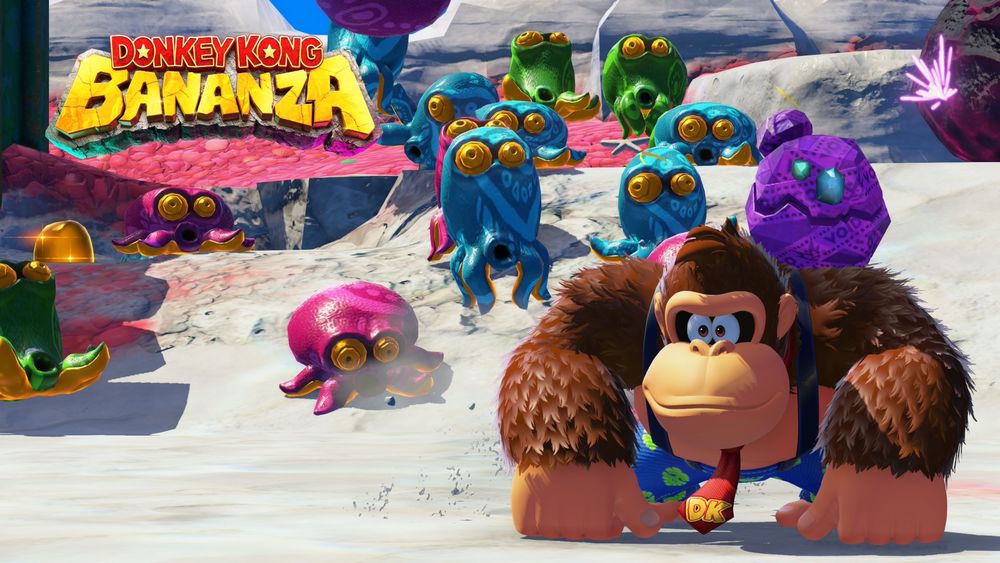 Donkey Kong and Odd Rock sit unperturbed by the swarm of squid-like enemies approaching from behind.