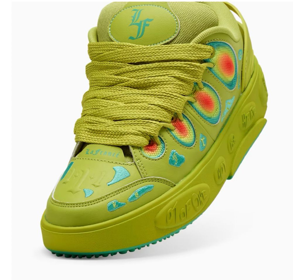 A shoe that is mostly a lime green but it looks like a heat map on the sides of the shoe.