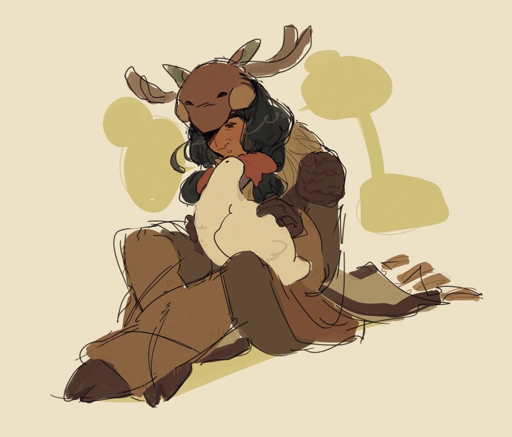 Perrine August (Yaelokre), their moose mask resting on their head and with a slightly solemn look on their face, sits cross-legged on the ground while conversing with a white hen they have held on their lap. 