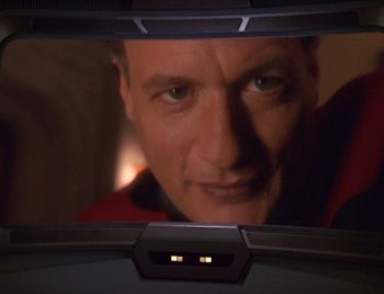 Q played by John de Lancie as seen on Voyagers viewscreen