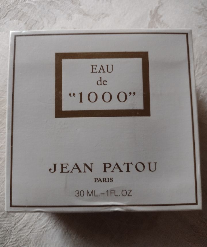 A sealed bottle of 1000 by Jean Patou. The box is a plain white square with simple gold writing announcing the name and size. Excuse my bragging, but I have several bottles of 1000 and they all smell incredible. If buying, do not waste your money on the P & G Prestige version or later. It's not their fault -- who could compete with a man willing to fund his own osmanthus farm in China?

More info here:

https://raidersofthelostscent.blogspot.com/2018/02/how-to-recognize-jean-patou-fragrances.html?m=1
