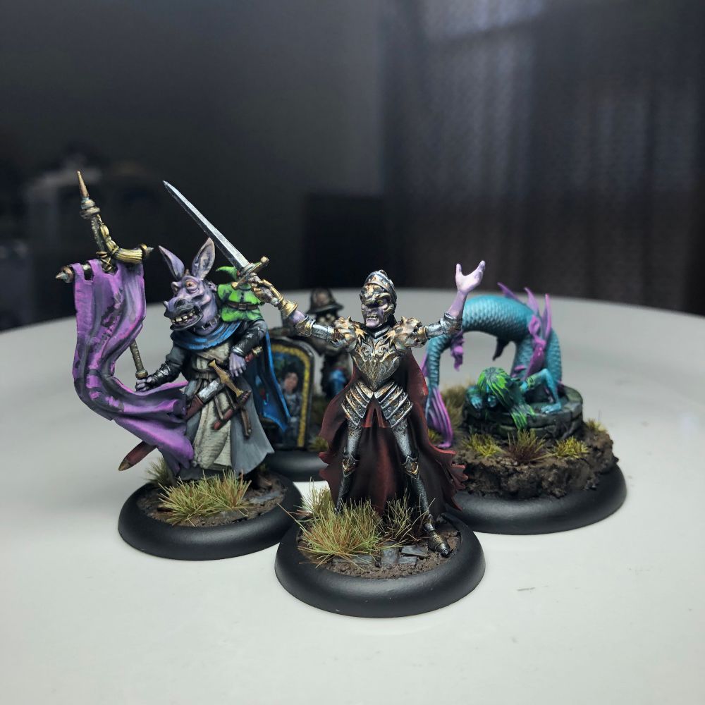 Greymare, and Negroli are a couple of of undead knights. Fully painted, and varnished with tufts of grass over old cobble stones