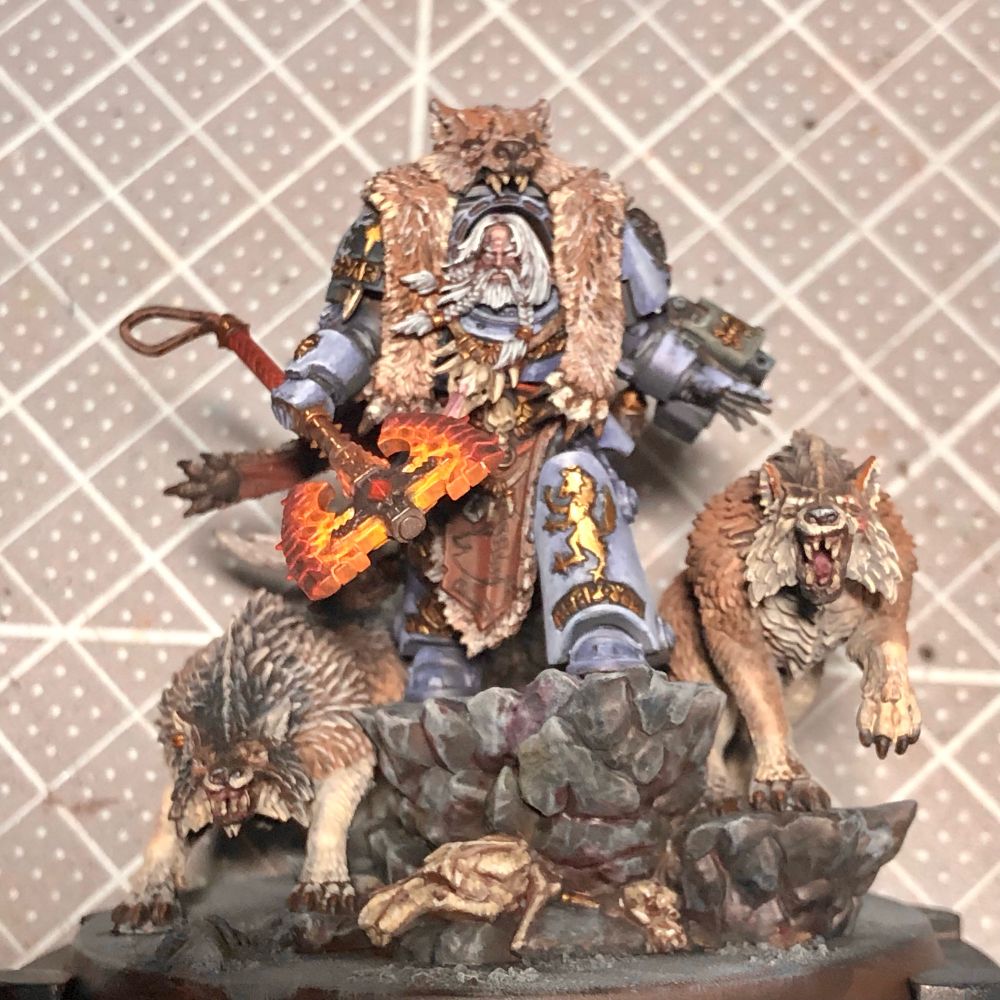 Logan Grimnar’s new model. Painted in the soft blue grey of the 40k incarnation of space wolves. The wolves unionized, and no longer pulling a sled