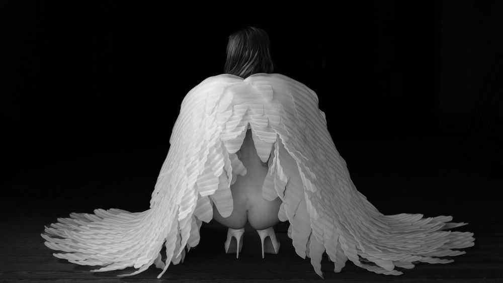 nude girl with angel wings