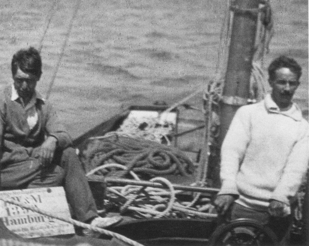 Photo of Gordon Shephard and Erskine Childers on board the yacht Asgard during their sailing to bring arms to Ireland in July 1914. 