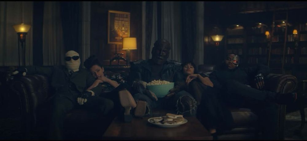 The Doom Patrol gang watching a flick.
