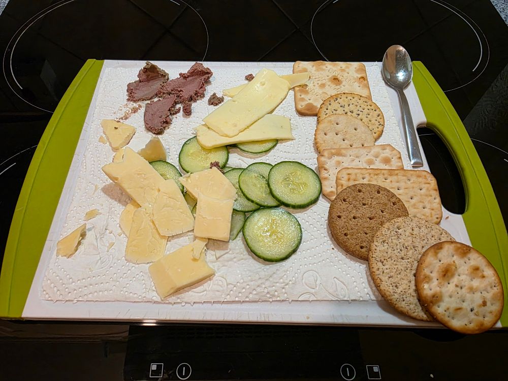 chicken parfait, cheddar, cucuber, *slabs* of butter - all situated alongside 8 'biscuits for cheese' and an teaspoon.