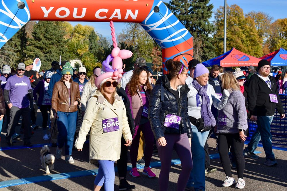 A group of people walking at the start of last year's City Park Classic.
