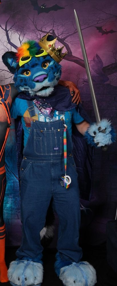 Bluefire dressed up as a prince with a cape, sword and crown. 