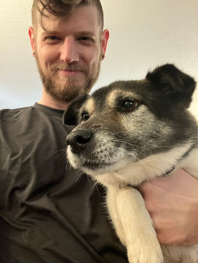 Me holding dog 