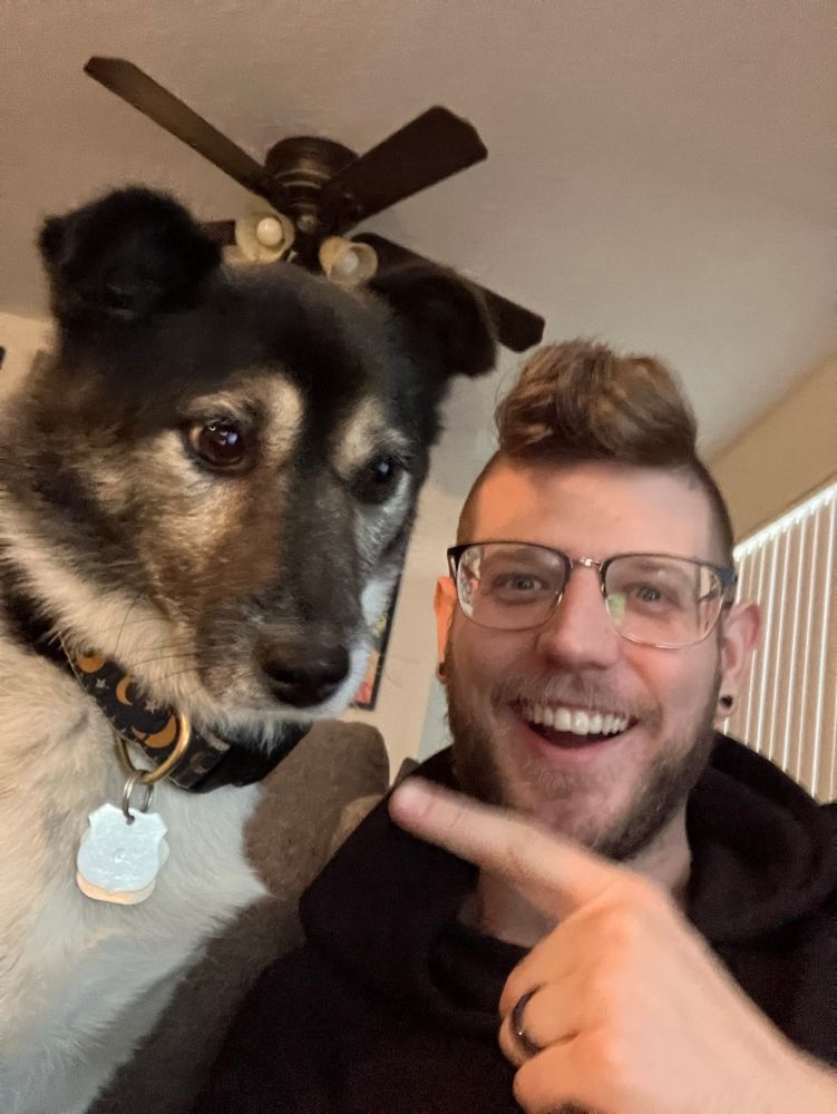 Me pointing at dog 