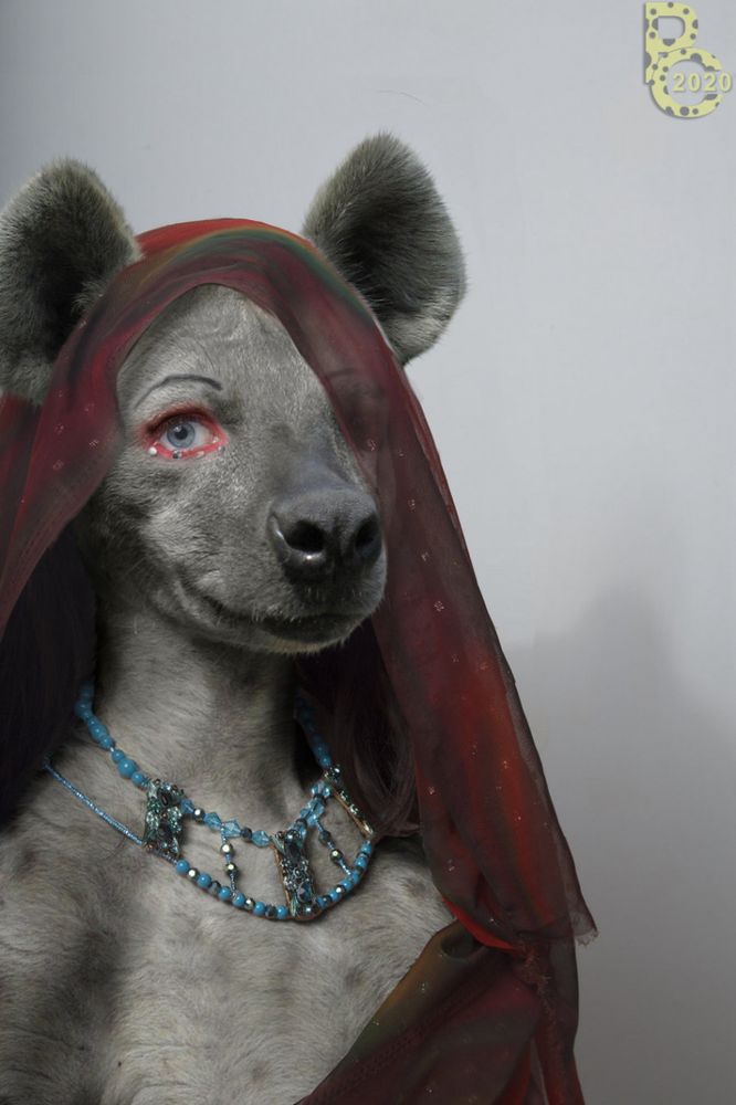 A photomanipulation of the same hyena woman using the same base image, but with better blending and lighting