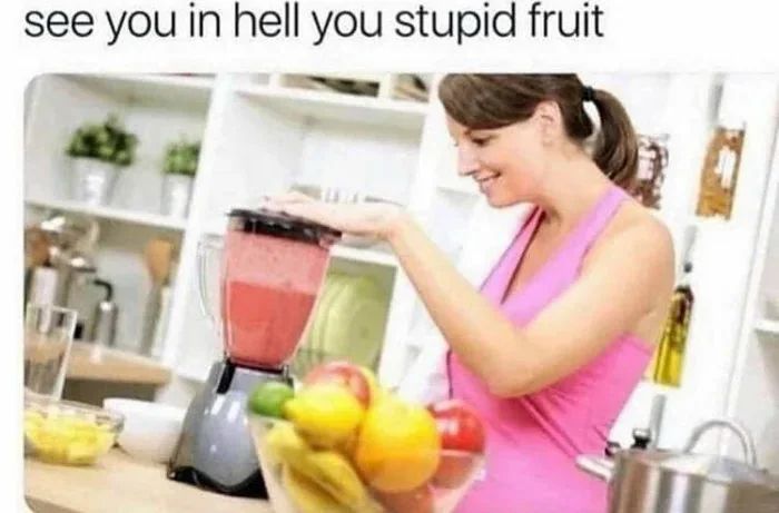 A woman grinding fruit in a blender with a caption that says “see you in hell you stupid fruit”
