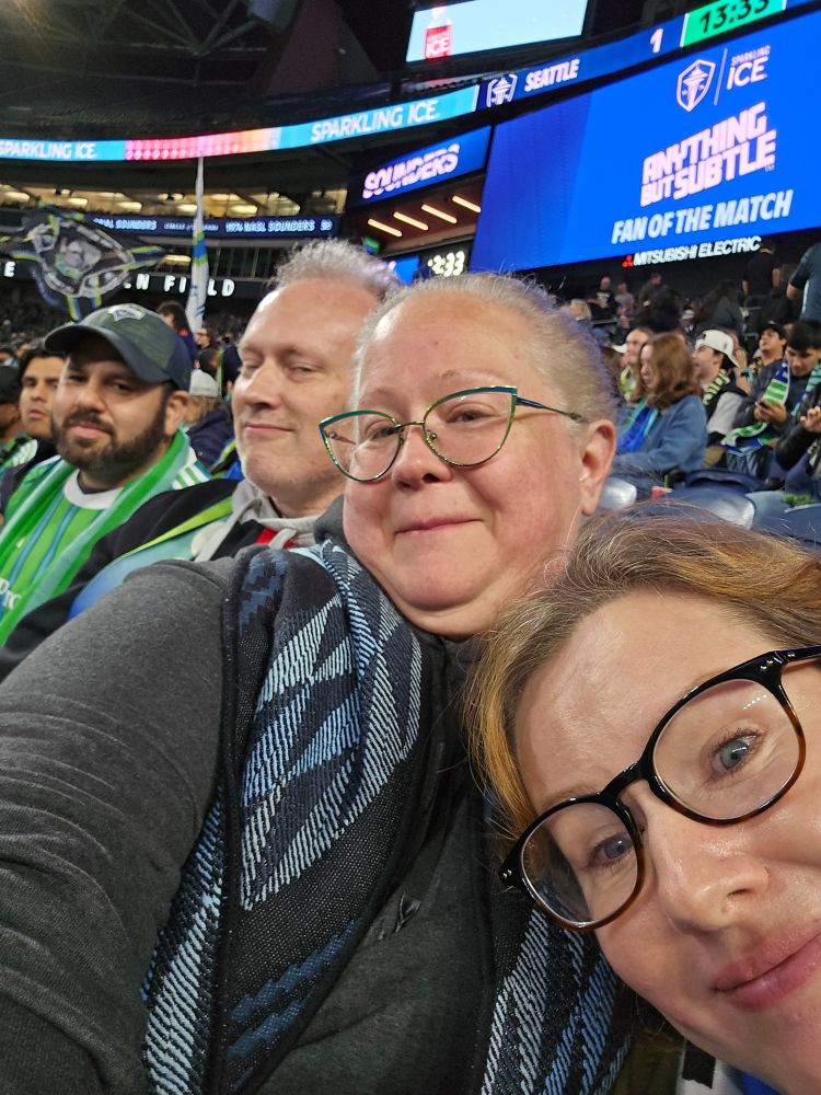 Some folks at a Sounders game.