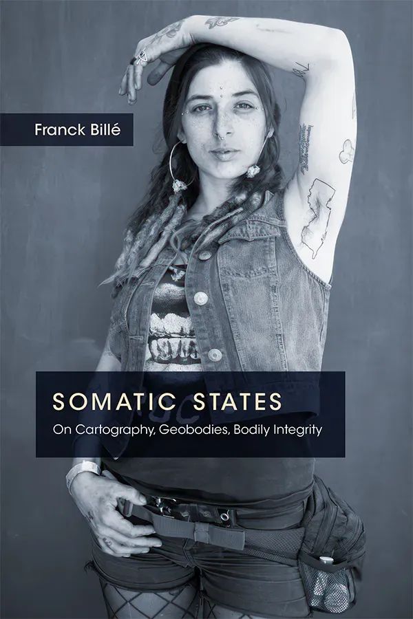 Cover of Somatic States: On Cartography, Geobodies, Bodily Integrity by Franck Billé. Cover art is a medium shot of a woman with her left hand posed above her head and right hand resting on her belt. She has several tattoos, most notably a New Jersey outline surrounding her armpit. She is dressed in a punk style, with a ripped denim vest and fishnet tights. The cover is desaturated, with a blue tint over it.