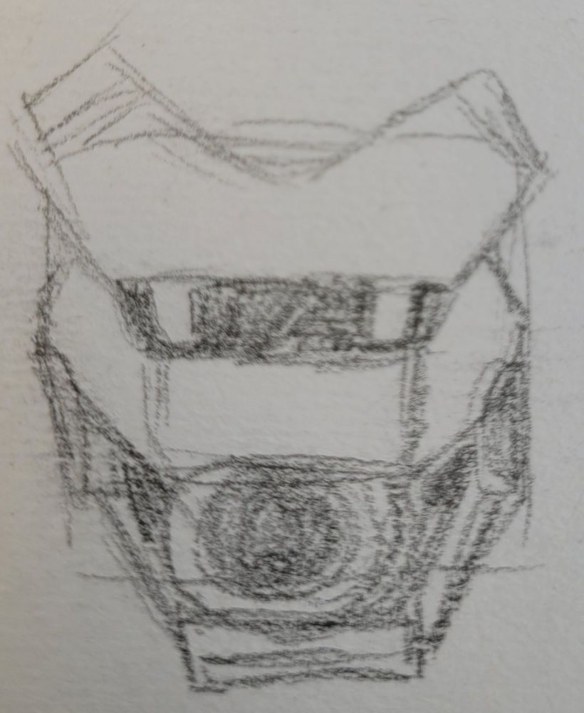 A front view of the head with the mouth open showing its cannon