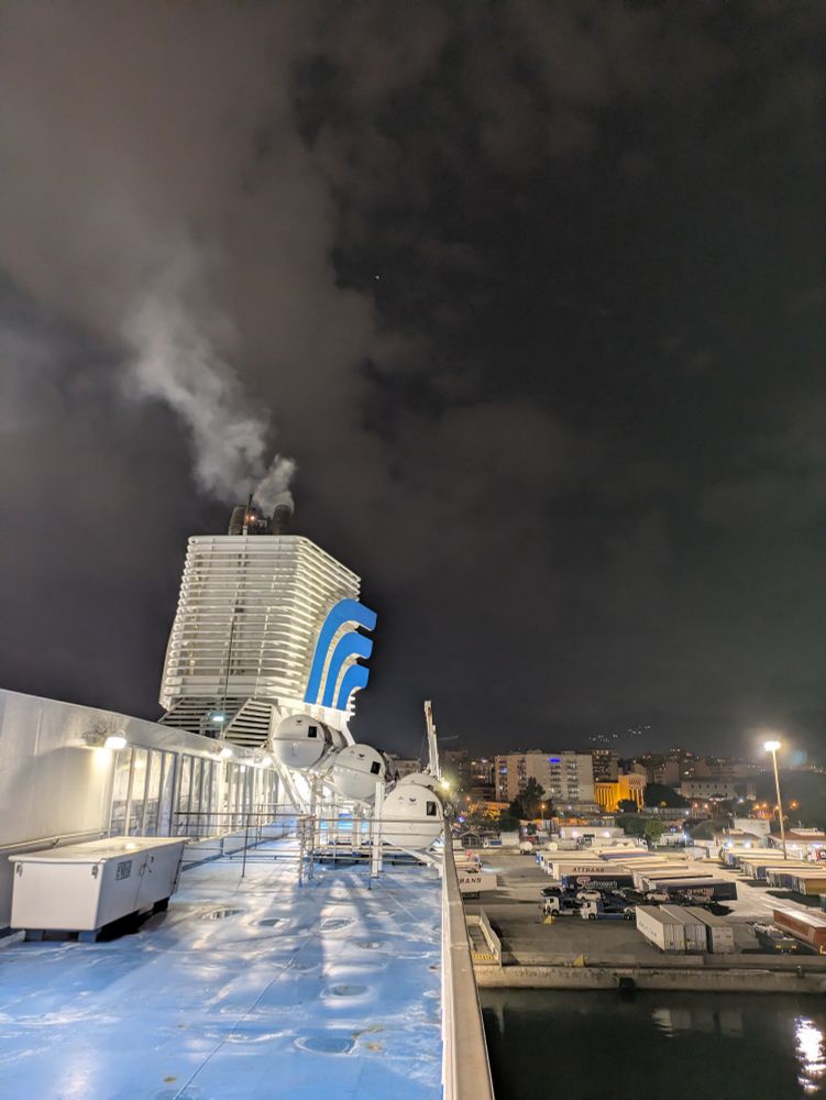 View from the outside deck of the ferry, with the harbour in the background 