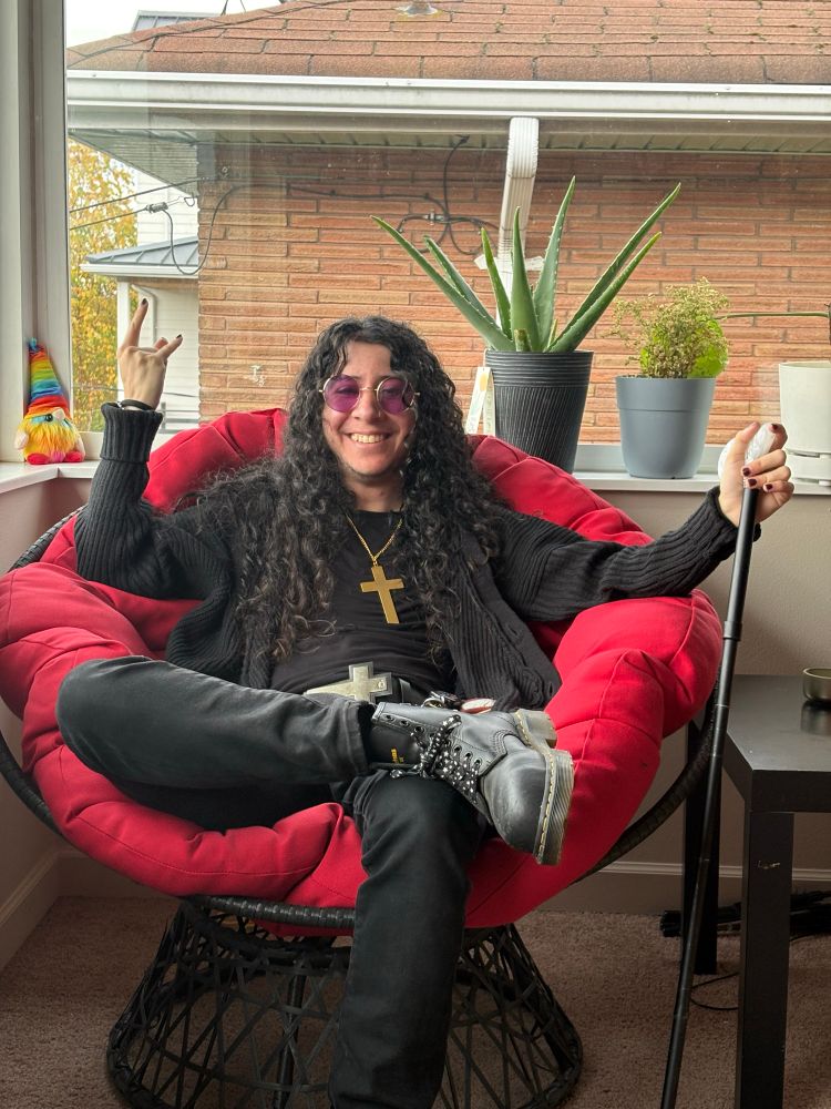 Ozzy Osbourne as a transsexual, sitting in a red papasan chair