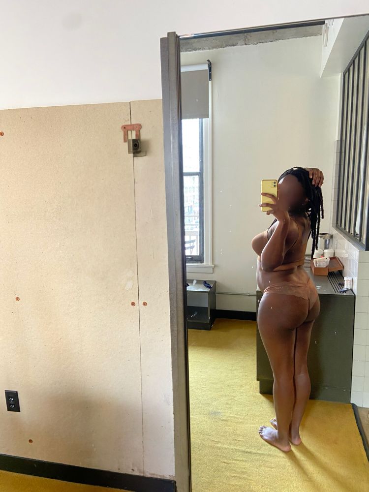 Black fem posing in nude brown panty and bra