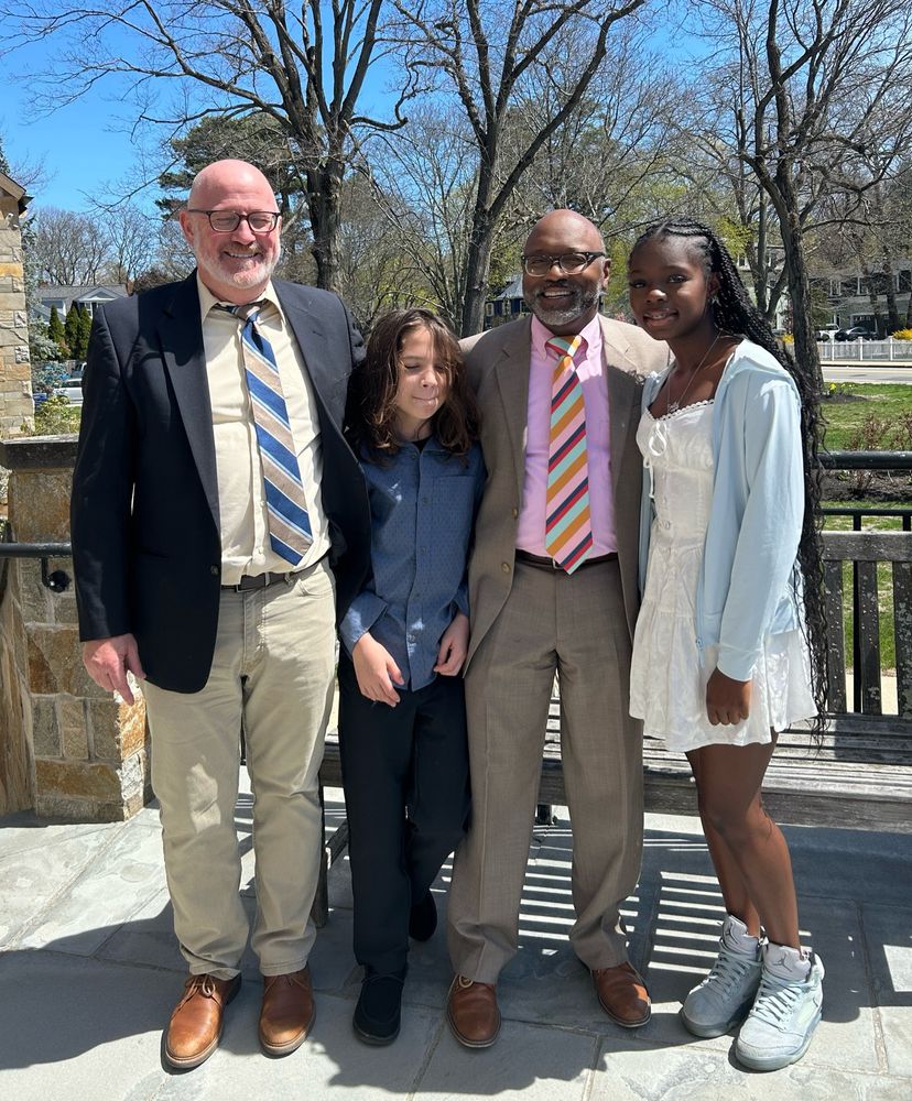 A family of four poses for their Easter photo