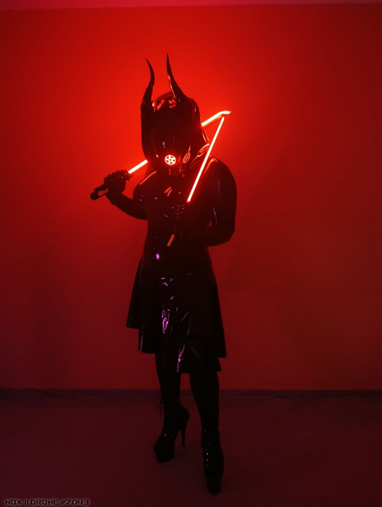 You look into my visor and you see nothing, just dark Void. When I look thru your eyes then I see your fears, sins and dark hidden desires. Demonic Huntress of the Void