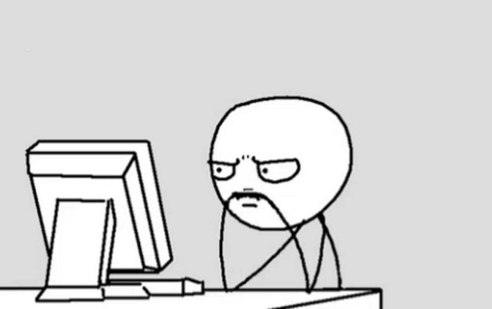 a black and white drawing of a stick figure sitting in front of a computer monitor