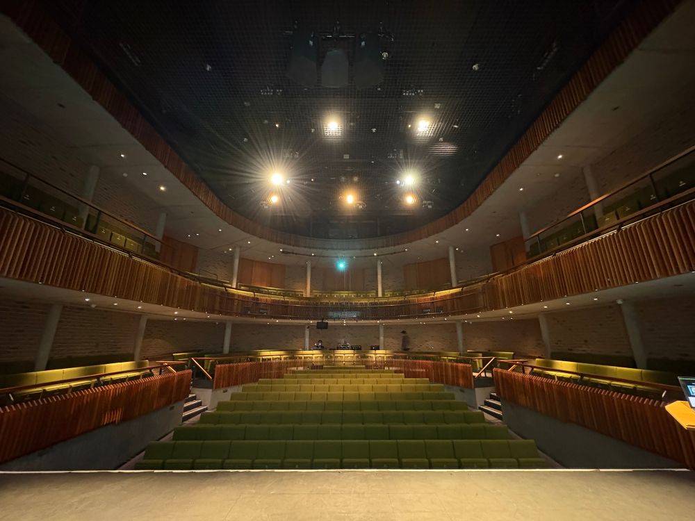 An empty theatre, with tiers of seating