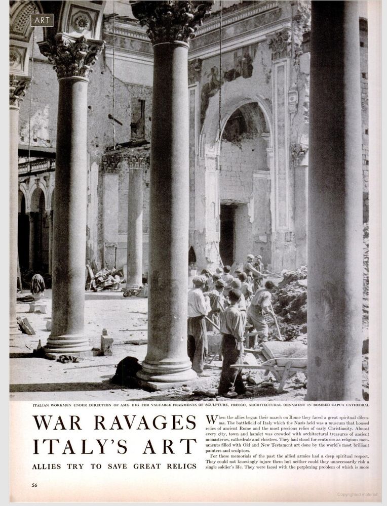 Workers dig for fragments in bombed Capua Cathedral. 