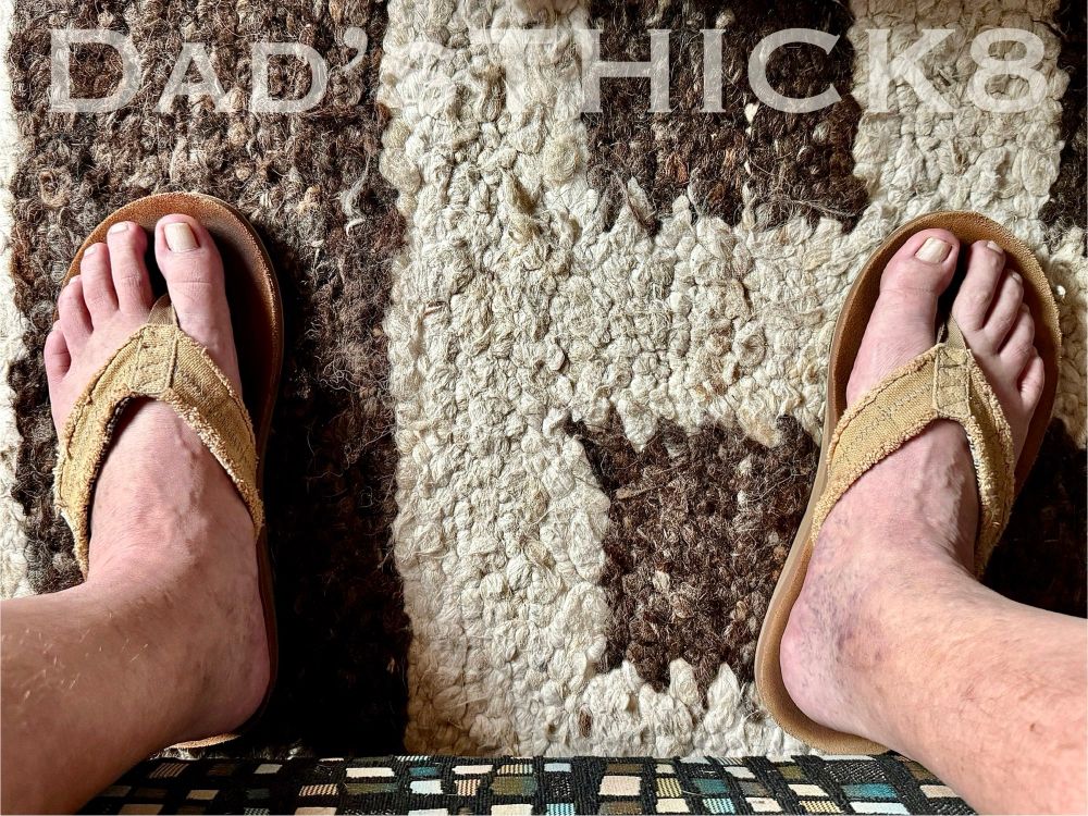 My feet in a pair of flip flops 