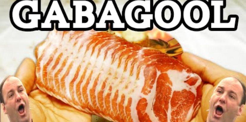 Tony Soprano’s head, his mouth open, in the background are slices of gabagool, and big white text that reads “GABAGOOL”