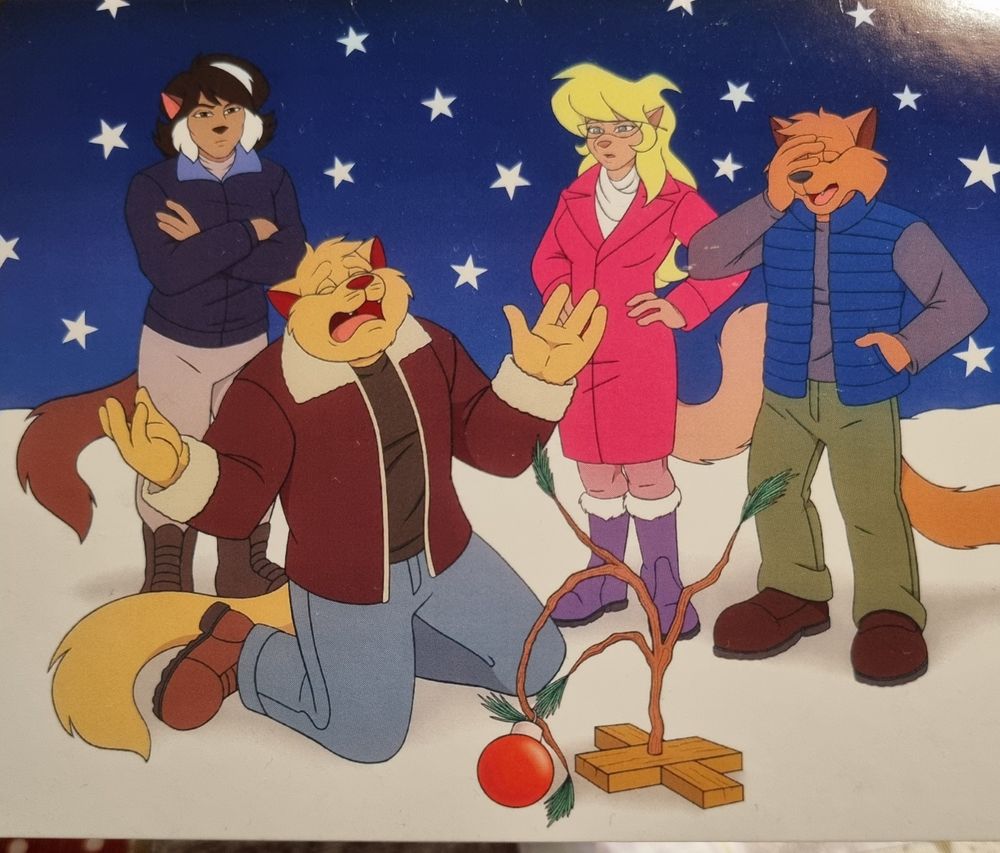 Christmas card featuring Swat Kats characters: Chance, Jake, Callie, Felina. Chance is crying over a very sad looking Christmas tree while everybody else looks at him with exasperation.